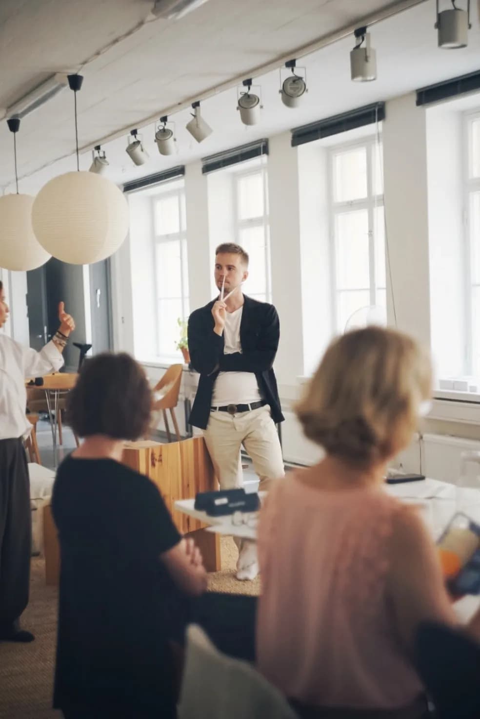 Guests at a perfume making workshop in a bright Helsinki studio